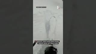 Watch: Snowboarder Buried Head-First Saved In Heroic Rescue