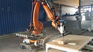 KUKA milling cell. KR Quantec 210 KRC4 on a linear track. 3D milling