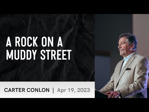 A Rock on a Muddy Street