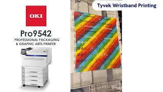 Print direct to Tyvek Wristbands using the OKI Pro9542 CMYK+White Printer. (certain Tyvek only)