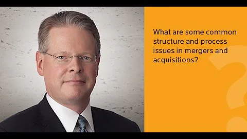 What are some common structure and process issues in mergers and acquisitions?