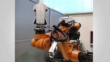 Integrated multilateration for large scale manufacturing system automatic verification