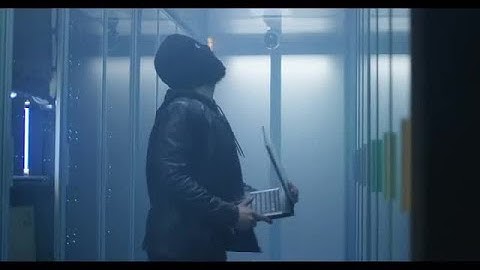 Masked Hacker Destroying Servers Stock Video