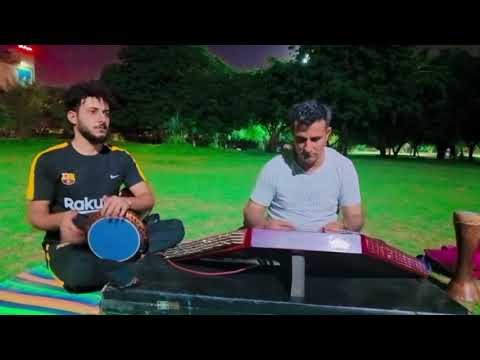 مقطع من عازف السنتور علی العموری مع عازف الایقاع سمیر الامیر 