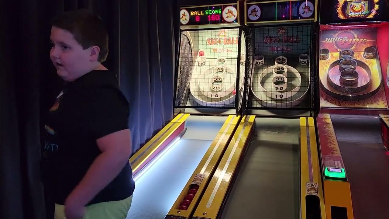 Dave and Busters day with the family (4 Joey finishing up on skee ball