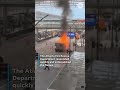 Watch dramatic video of a van engulfed in flames at airport #Shorts