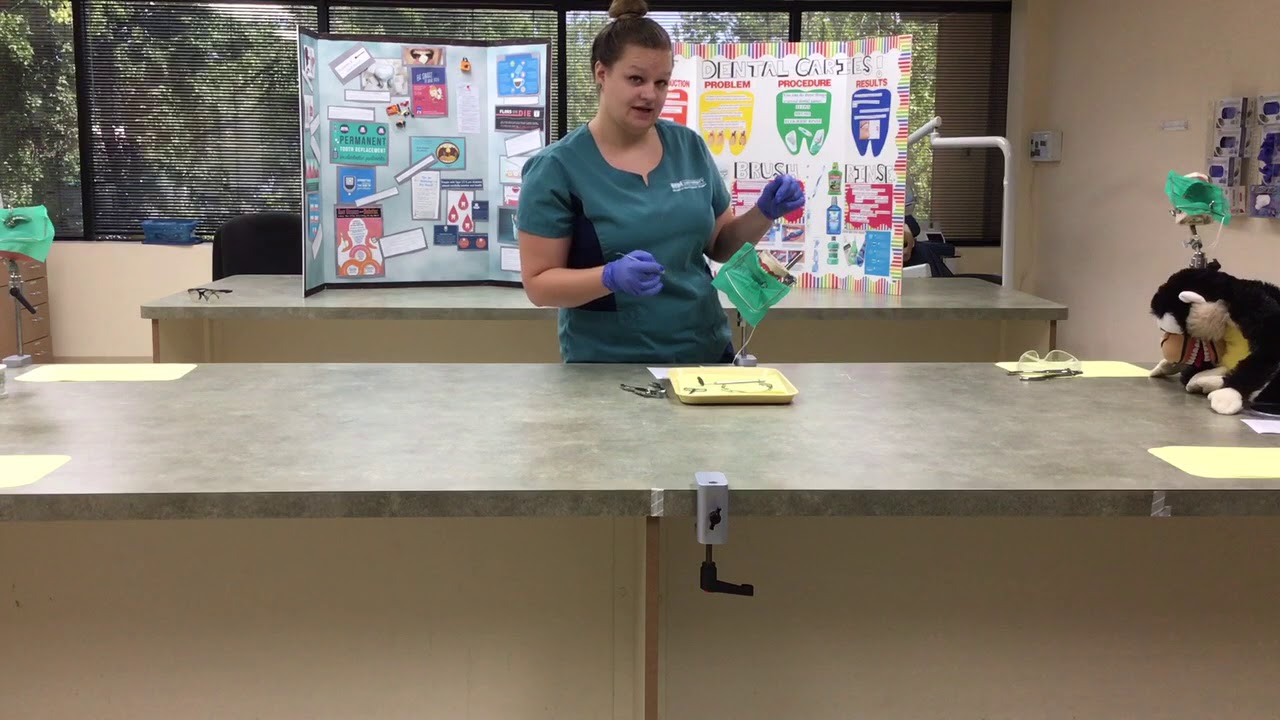 COM 115 Speech Preparing, placing, and removing a dental dam Dental