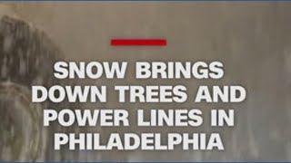 Heavy snowfalls bring down powerlines and trees in Philadelphia