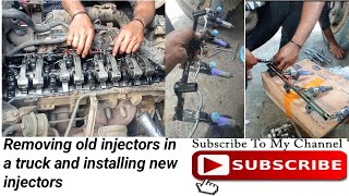 Removing old injectors in a truck and installing new injectors ( isuzu 4hl1 engine)