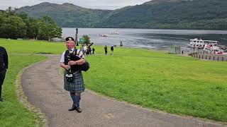 Bagpiper On Loch Lomond - Highland Cathedral