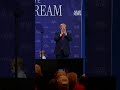 Trump stops child from wandering, takes swipe at Biden