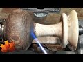 woodturning :captive ring on burnt vase in oak log