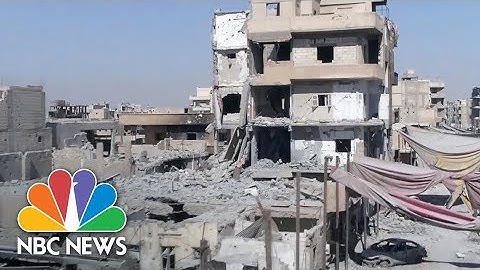 Drone Video Reveals Destruction As Raqqa Is Officially Declared ‘Liberated From ISIS’ | NBC News
