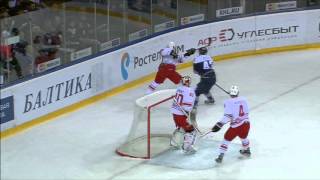 Jan Kovar staples Dmitry Megalinsky behind the net