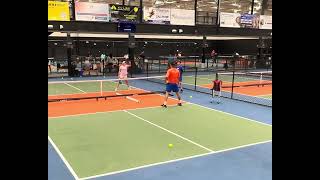Junior 12/13 year old Ryan and Valentina practice with coach Sam Morris