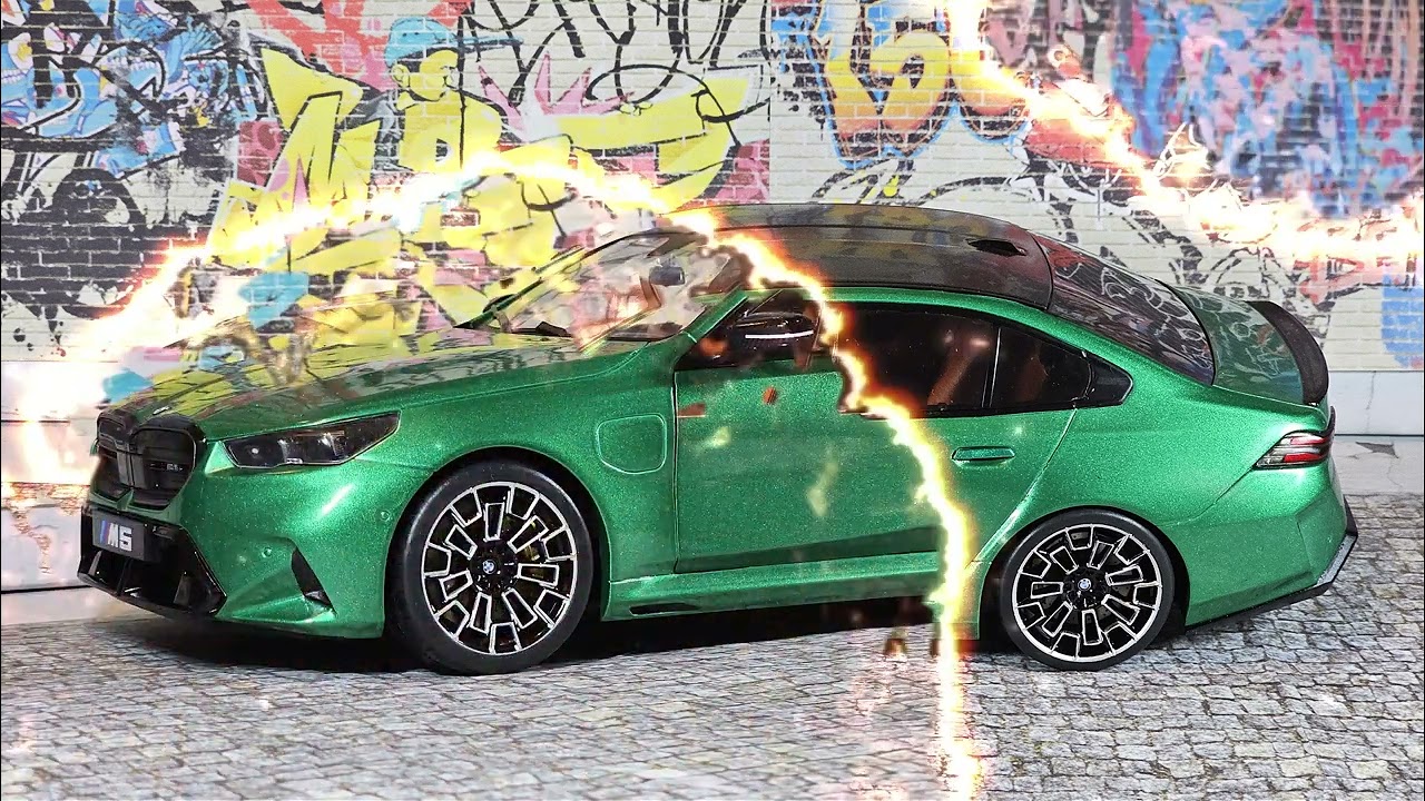 1/18 BMW M5 in Isle of Man Green Metallic colour. Made by Solido.