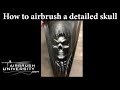 How to airbrush a skull.  Learn to paint a grim reaper, detailed skull, and knife edge.