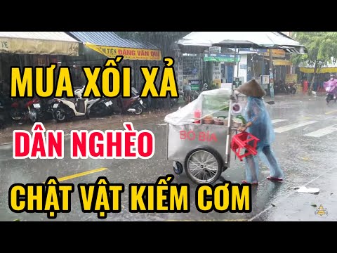 Video SÀI GÒN MƯA XỐI XẢ người lao động nghèo chật vật trong... - YouTube