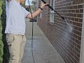 Cleaning slurry of brickwork using SlurrySafe AR.