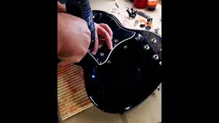 Gibson SG nitro refinish.