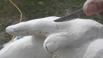 Embracing the light using a riffler file on the hand