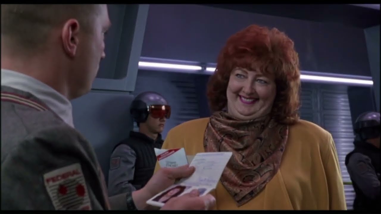 Arnold Schwarzenegger Tries to Evade Michael Ironside in Robotic Drag in Total Recall (1990)