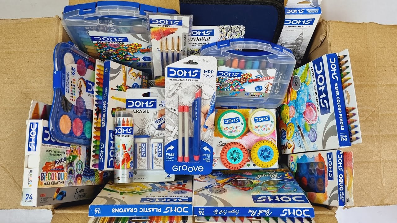 Box full of doms stationery items - retractable eraser, Plastic Crayons, drawing pencil, brush pens
