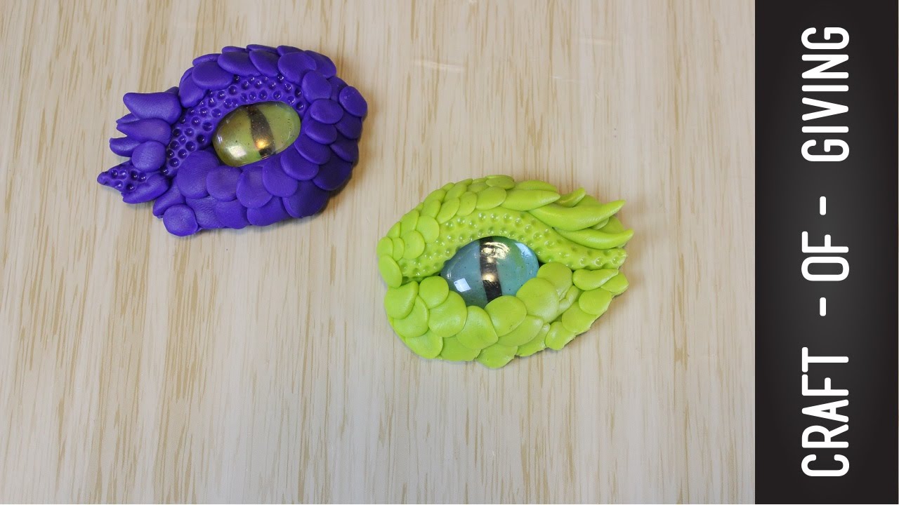 Polymer clay, glass dragon eye and raw crystal combined in…