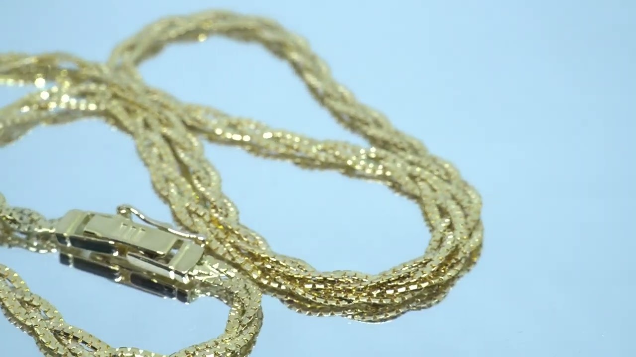 緑と金の編み込みネックレス