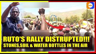 BREAKING: Stones, Soil and Bottles Fly as Ruto Flees Podium in Sigor