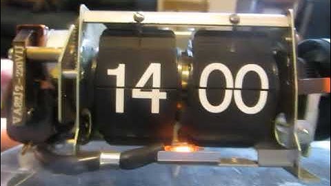 Perspex-cased electric flip alarm clock