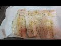 BAKED AND SEASONED FISH FILLET WITH MAYONNAISE.