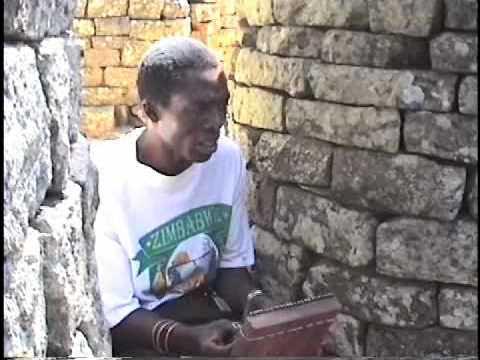 Forward Kwenda playing mbira at Great Zimbabwe 1998