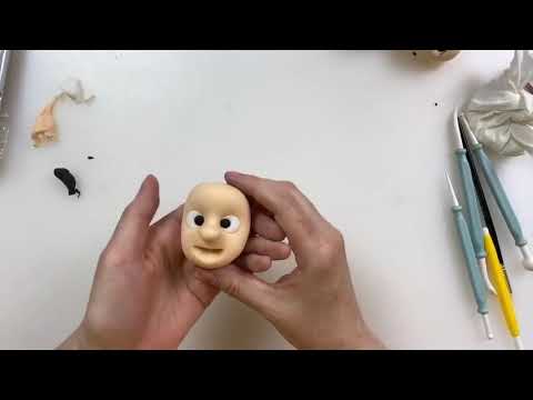 Creating a face using Squires Kitchen HD Modelling paste and tools.
