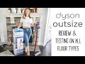Dyson outsize total clean  review  testing on all floor types  battery  bin put to the test