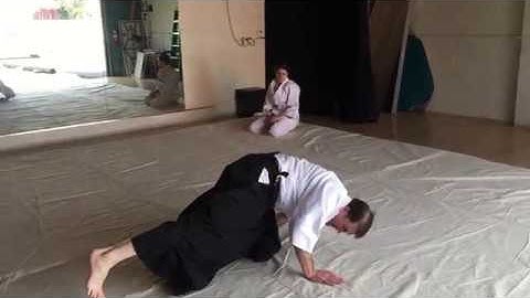 How to do an Aikido backward roll (ushiro ukemi) from standing