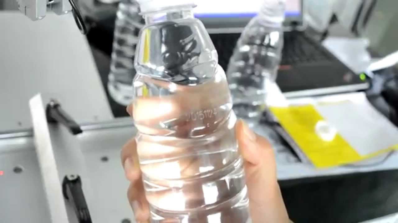 Transparent PET water bottles marking by CO2 fiber laser marking