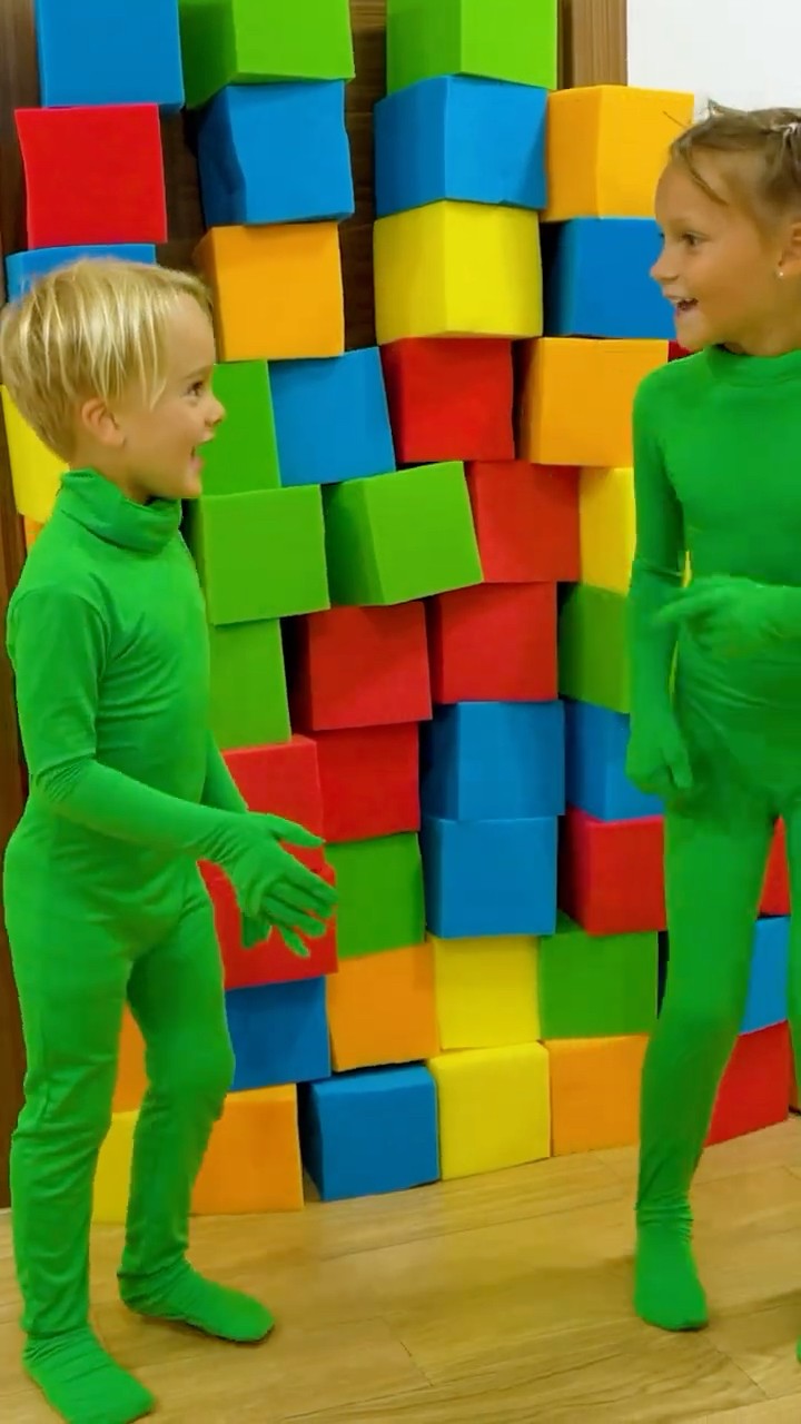 Chris plays in the invisibility cloak with his uncle