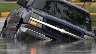 Driving in floodwater is a bad idea — you can't tell where the ditches are | Raw video on Oliver
