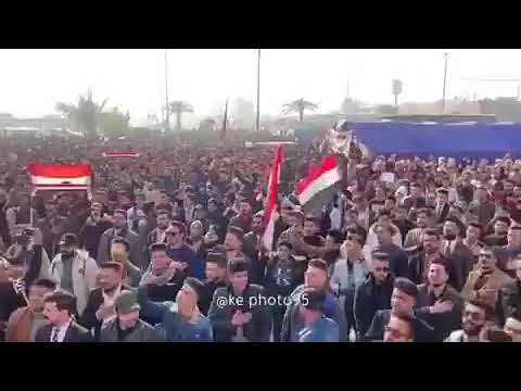 صوت النشيد الوطني العراقي بصوت طلبة جامعات النجف من أمام بوابة جامعة الكوفة