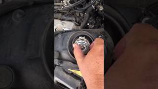How to change a headlight bulb in a 2001 Nissan Maxima