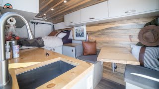 Solo Female Digital Nomad in DIY High Roof ProMaster with Fixed Bed \& Workspace