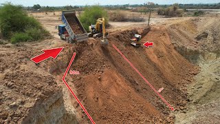 Best Action Excavator And Bulldozer  Are Working Hard Pushing Soil To Delete Pond