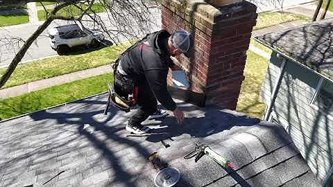 Watch as we install counter flashing on a Chimney