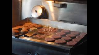 World famous burgers comin' off OLD SCHOOL grill @ Hinano Cafe, Venice Beach dive bar LA Los Angeles