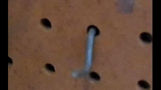 Stop pegboard hooks from flying off - quick and cheap