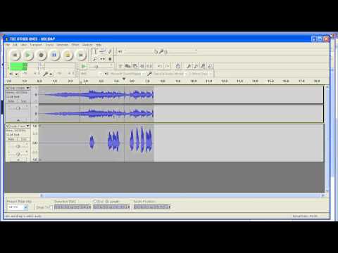 How to reduce volume on one track in Audacity
