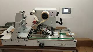 Automatic labelling of small paper bags with LAB510
