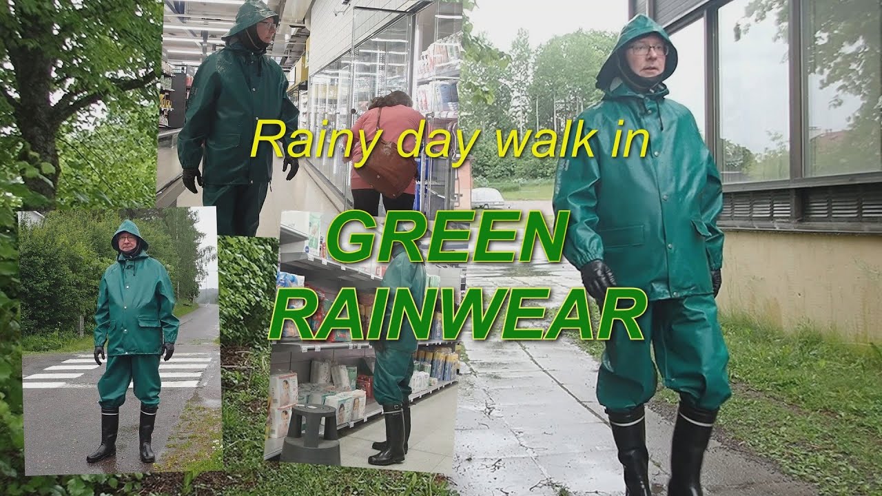 enjoying summer rain in green rainwear