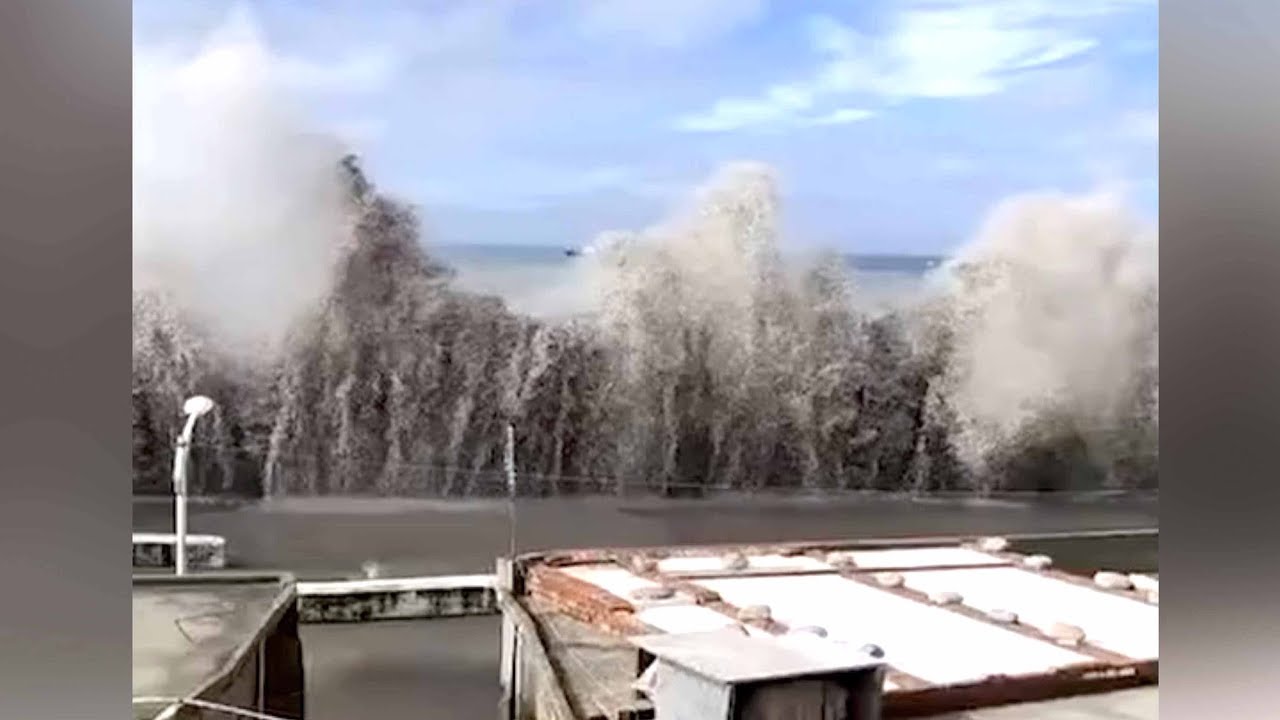 Passing Typhoon Danas brings gales, high waves